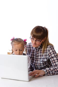 mother and daughter on the computer.