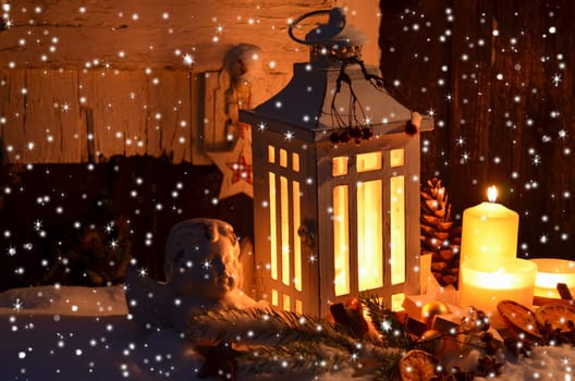 Lantern in the snow contemplative Christmas candlelight