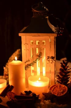 Lantern in the snow contemplative Christmas candlelight