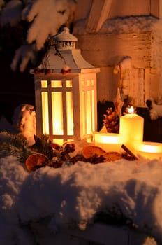 Lantern in the snow contemplative Christmas candlelight