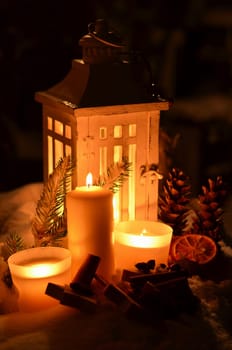 Lantern in the snow contemplative Christmas candlelight