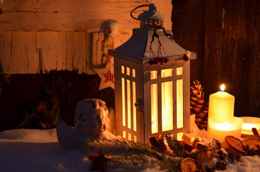Lantern in the snow contemplative Christmas candlelight