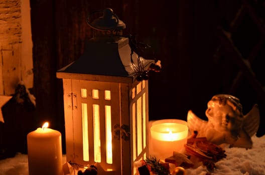Lantern in the snow contemplative Christmas candlelight
