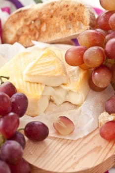 Caese,bread and fresh grapes