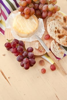 Caese,bread and fresh grapes