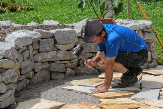 Laying of natural stone slabs,raised bed