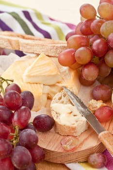Caese,bread and fresh grapes