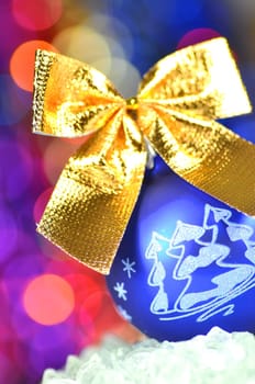 christmas decoration, Christmas ball with golden bow in bokeh background