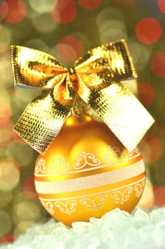 christmas decoration, Christmas ball with golden bow in bokeh background