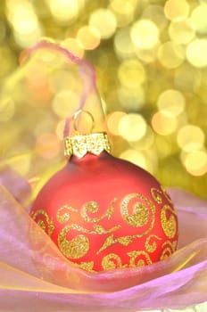 christmas decoration, red Christmas ball against bokeh background