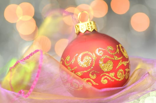 christmas decoration, red Christmas ball against bokeh background