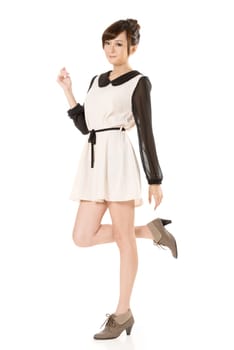 Asian beauty wear a spring dress, full length portrait isolated on white background.