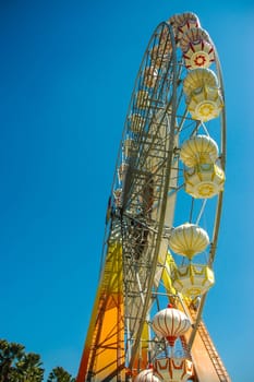 The ferris wheel in the amusement park in Thailand.