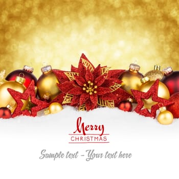 Golden red Christmas decoration on snow