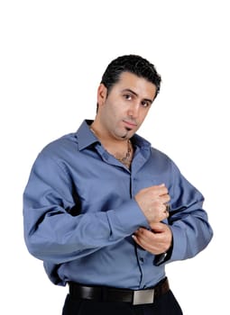 A young handsome man standing for white background very relaxed looking.into the camera..