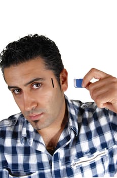 A close up picture of a young man try to put more memory in his brain,.for white background..