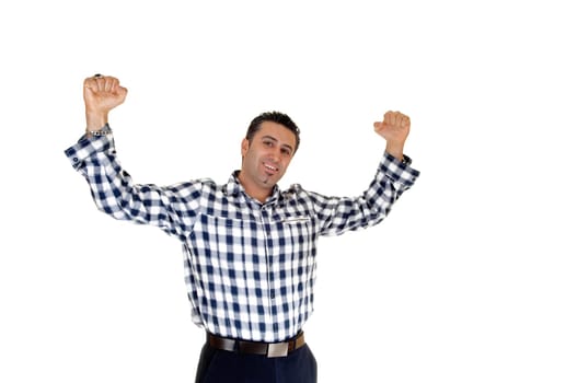 A tall handsome businessman standing for white background in a blue white.shirt lifting up his arms for happiness..