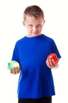 Boy holding water balloons isolated on white background
