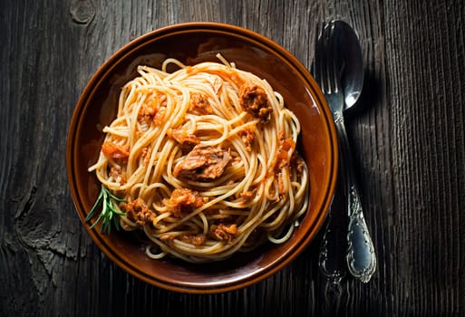 Fresh spaghetti wit tuna sauce overhead shoot