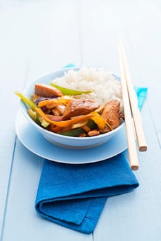 Fresh chicken with vegetables and rice close up shoot