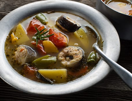 Healthy hot fish stew close up shoot