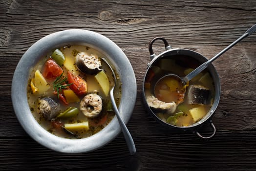 Healthy hot fish stew close up shoot