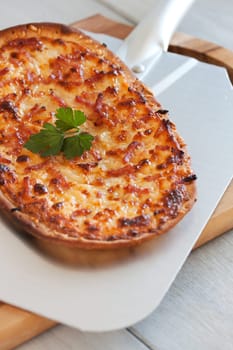 Tarte flambée on baking shovel