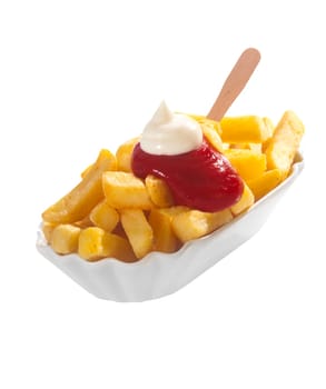 Dish of crisp golden potato chips or French fries topped with ketchup and mayonnaise and served with a wooden spatula over white