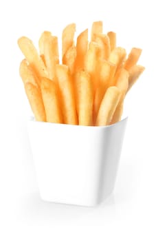 Crisp deep-fried golden potato chips, or French fries, standing upright in a plain white ceramic container over a white background