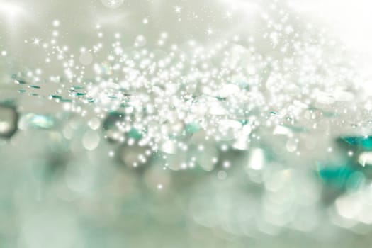 Abstract Christmas background of holiday lights, stars, and snowflakes