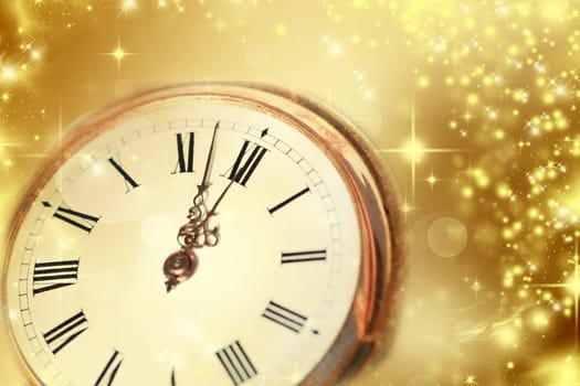New Year's at midnight - Old clock with stars snowflakes and holiday lights