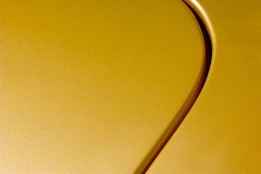 glittering golden vehicle panel abstract