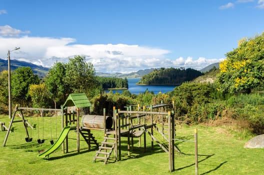 Playground in a natural setting with Neusa lake in the background in Cundinamarca, Colombia