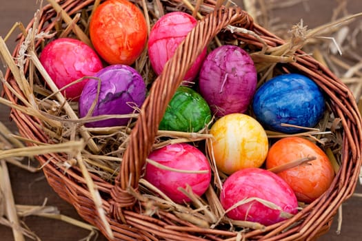 Easter eggs in wicker basket