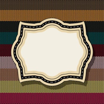 Retro style vintage label over a knitted background