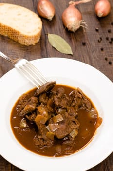 Braised hishulash goulash in portrait format