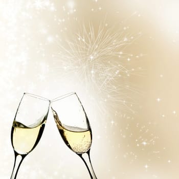 Glasses of champagne against holiday background