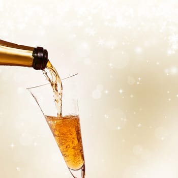 Glasses of champagne against holiday background