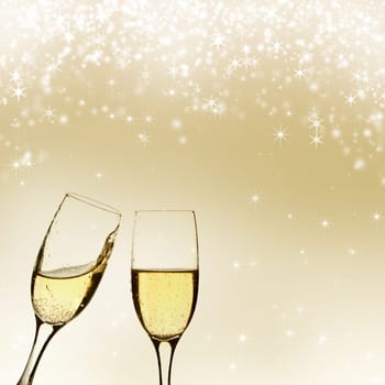 Glasses of champagne against holiday background