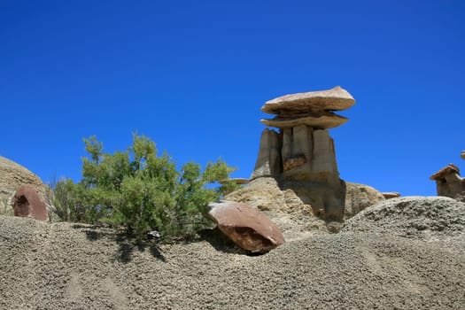 Horizontal shot of hoodoos in New Mexico Wilderness over blue sky