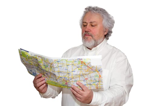 Senior is looking at a map he is holding in his hands