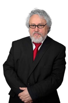 Gray haired senior wearing a dark suit and a red necktie