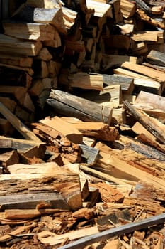 Freshly cut firewood logs in a stack