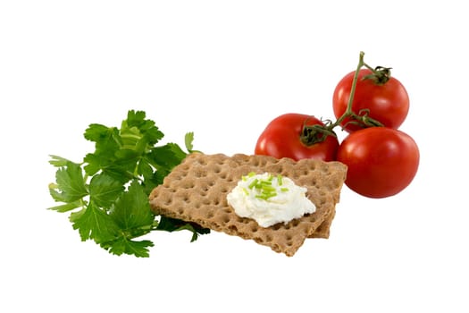 Crispbread with cream cheese, herbs and tomatoes