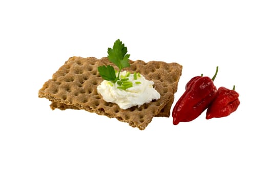 Crispbread with cream cheese, herbs and chile