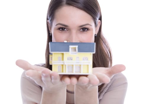 The dream of owning a home - woman isolated with a property
