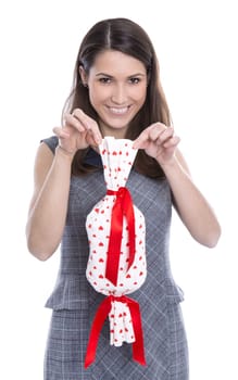 Young laughing woman isolated with a gift with hearts in red in hand