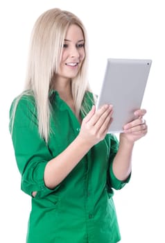 Young woman isolated in green blouse with tablet PC