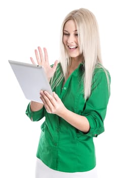 Young woman isolated in green blouse with tablet PC