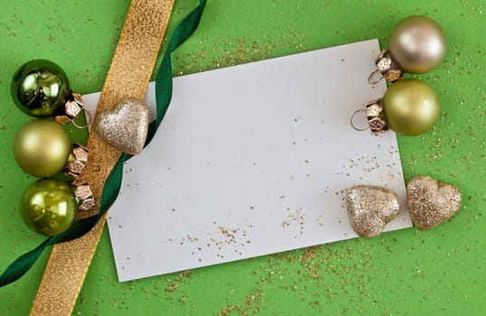 Background with green Christmas tree baubles and decoration for Christmas